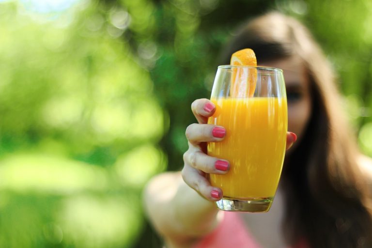 woman asking can creatine with orange juice safe